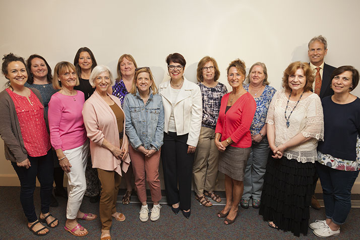 President Katherine Bergeron with the team of academic department assistants who were awarded the Team Service Excellence Award.