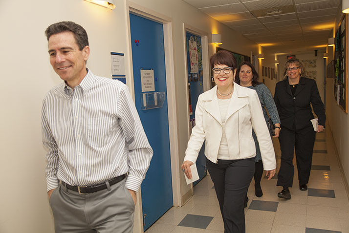 Dean of the College Jefferson Singer and President Katherine Bergeron on their way to announce the Service Excellence Award. 